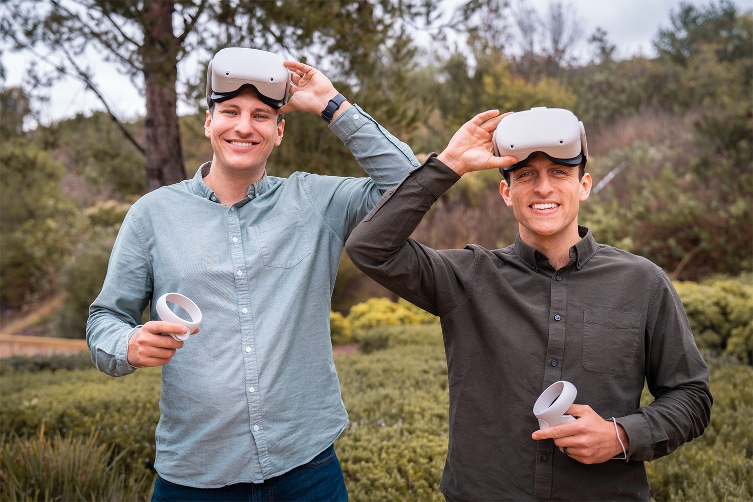 Immerse co-founders holding VR headsets
